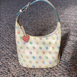 Dooney & Bourke Cream Logo Bucket Bag